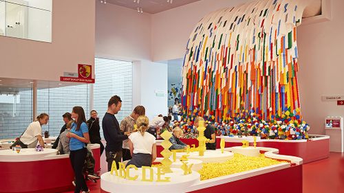 A waterfall made entirely of Lego bricks inside the building. (Lego)