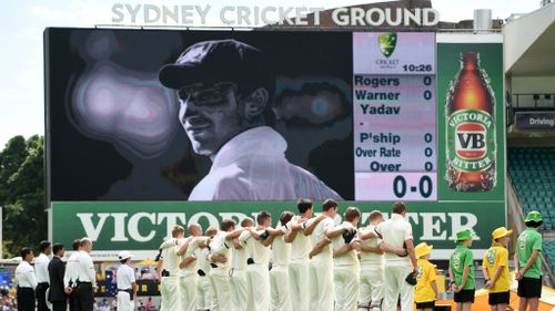 The SCG stopped to acknowledge Hughes during the national anthems. (AAP)