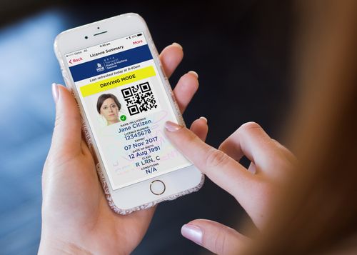 A consumer using a new app that the state government wants to roll out using digital licences across NSW. Picture: AAP