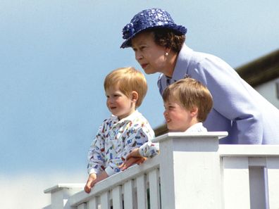 Queen Elizabeth with Prince Harry and Prince William as children.