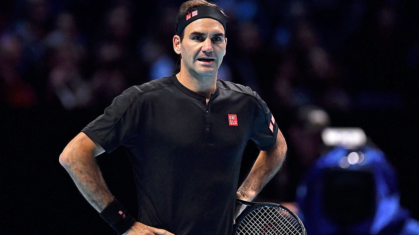  Roger Federer of Switzerland reacts as he questions a line call