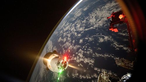 A frame from a time-lapse video by Pettit shows thrusters firing on a SpaceX Dragon cargo spacecraft after it undocked and backed away from the station's forward port on the Harmony module. The orbital laboratory was soaring 259 miles above the Pacific Ocean west of Hawaii at the time. 