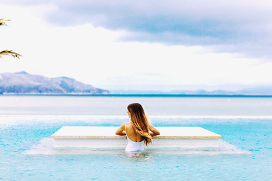 Woman in pool at InterContinental Hayman Island Resort in the Whitsundays