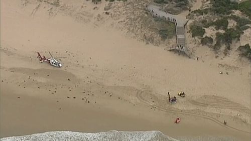 A medical helicopter was called to the beach. (9NEWS)