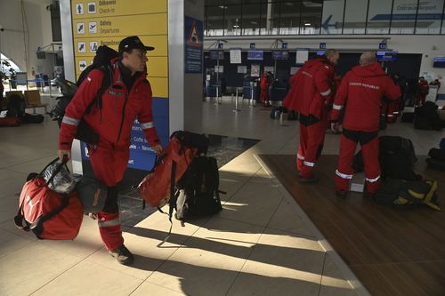 Members of urban search and rescue (USAR) team of Czech firefighters prepares to fly to the earthquake-hit Turkey to help search for people in debris, at Leos Janacek Airport, in Ostrava, Czech Republic, Monday, Feb. 6, 2023.