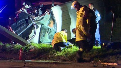 The driver lost control of his van and ploughed into a power pole, flipping the vehicle on its side. (9NEWS)