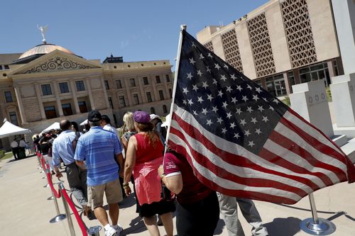 Patriotic Arizonans line up to pay their respects.