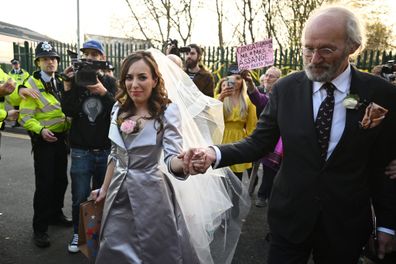Stella Moris leaves Belmarsh prison with Julian Assange's father, Richard Assange after marrying the WikiLeaks founder.
