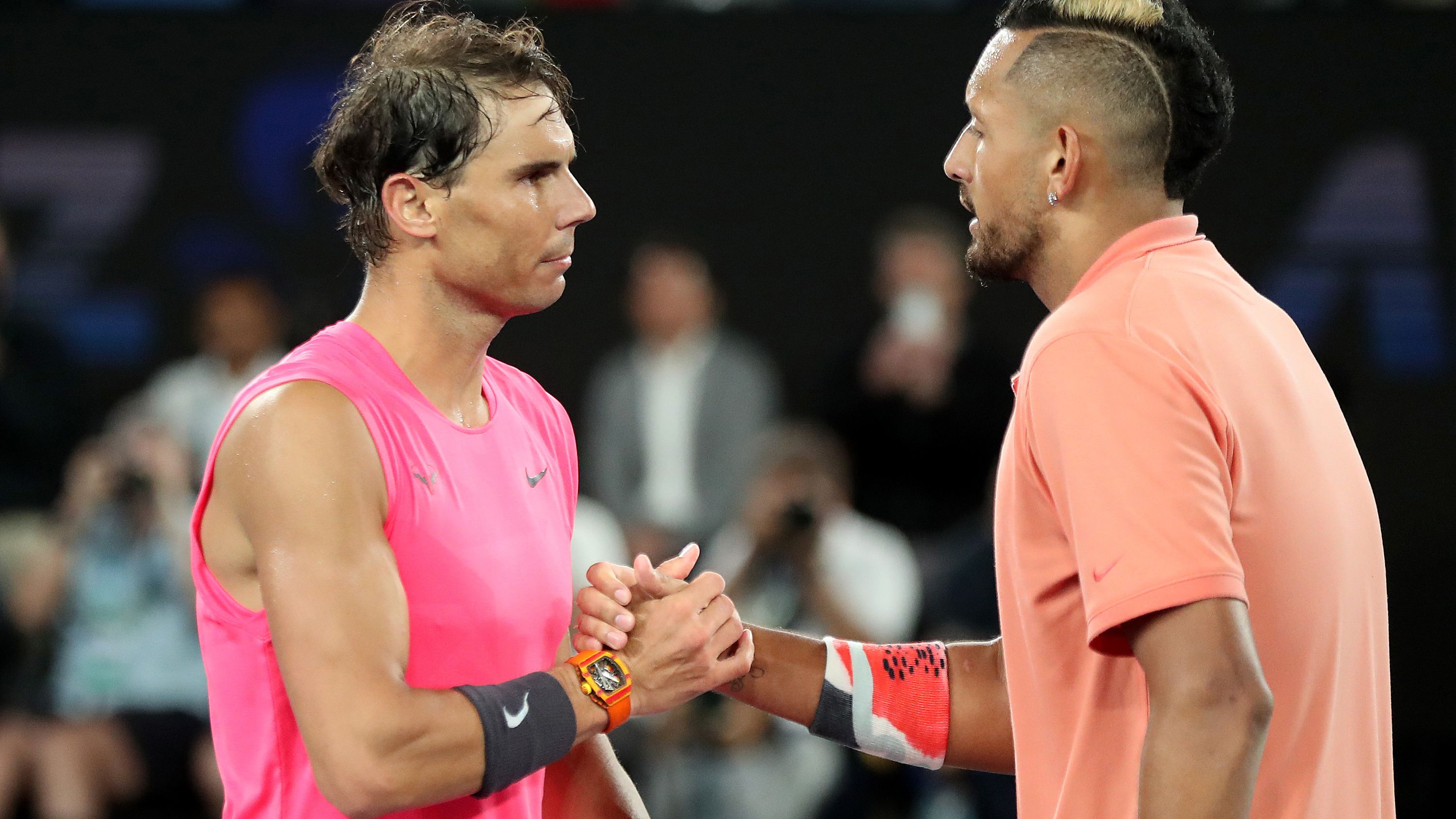 Nick Kyrgios shakes hands with Rafael Nadal at the 2020 Australian Open.