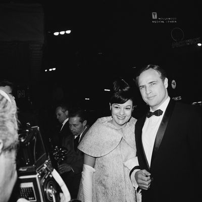 1960: Movita Castaneda and Marlon Brando