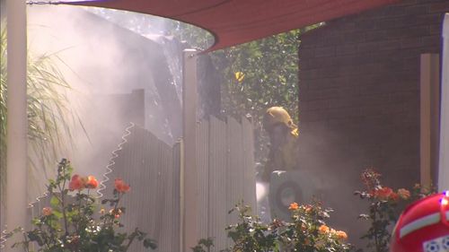 Neighbours also watered down their own homes as the grass and gutters started to catch alight.