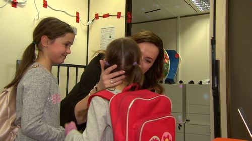 Drop-off and pick-up may no longer be part of the school holidays routine for parents. (9NEWS)