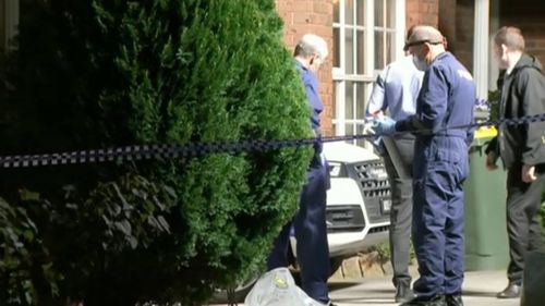 The bodies were found outside a Nunawading home.