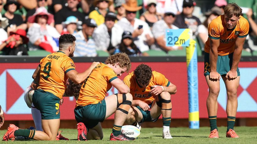 Australia players react following the final siren.