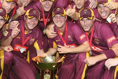 The paceman celebrated as Queensland won the Ryobi Cup in 2013.