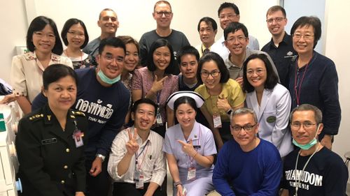 Australian 'hero' doctor Richrd Harris has met the Thai medical staff taking care of the 12 young boys he helped rescue from an underground cave this week. Picture: Supplied.