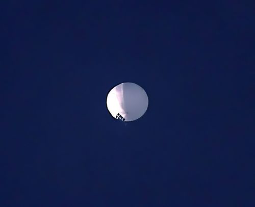 A high altitude balloon floats over Billings, Mont., on Wednesday, Feb. 1, 2023. 