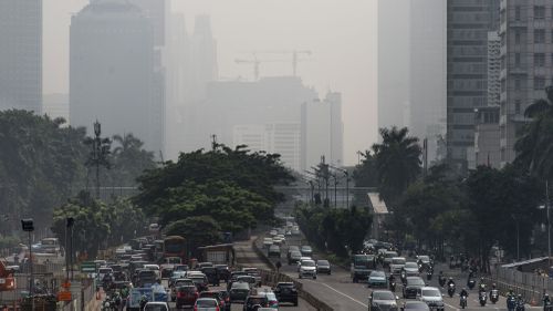 Buildings in downtown Jakarta are shrouded in a thick haze made worse by fires burning in rural provinces around the region. 