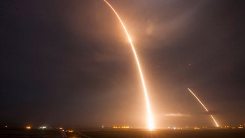 A long exposure of the rocket's launch and re-entry. (Twitter / @SpaceX)
