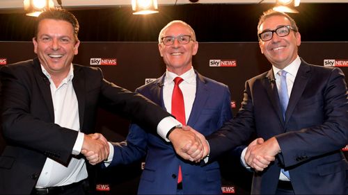 Nick Xenophon, Jay Weatherill and Steven Marshall have clashed during a neck-and-neck SA election campaign. (AAP)