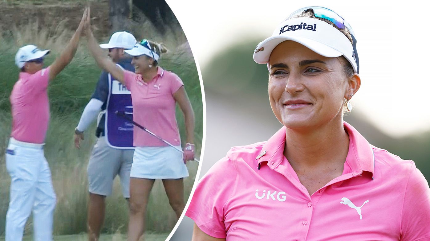 Lexi Thompson high fives playing partner Rickie Fowler after she hit a hole in one at the par-3 16th at the Grant Thornton Invitational.