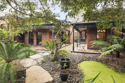 Behind the garage of a Melbourne home for sale lies a 'cocktail shed'
