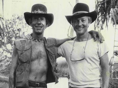 John Cornell, Paul Hogan pose together on the set of Crocodile Dundee in 1984.