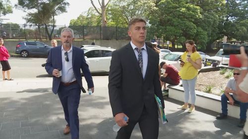 Callan Sinclair (right) outside court. November 19, 2020.