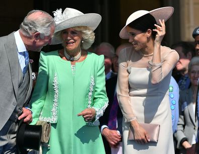 LONDON, ENGLAND - MAY 22:  Prince Charles, Prince of Wales, Camilla, Duchess of Cornwall and Meghan, Duchess of Sussex attend The Prince of Wales' 70th Birthday Patronage Celebration held at Buckingham Palace on May 22, 2018 in London, England.  (Photo by Dominic Lipinski - Pool/Getty Images)