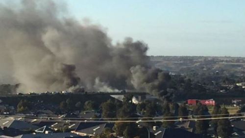 A thick plume of smoke pouring from the crash. (9NEWS)