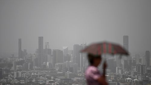 Brisbane skyline covered in smoke.