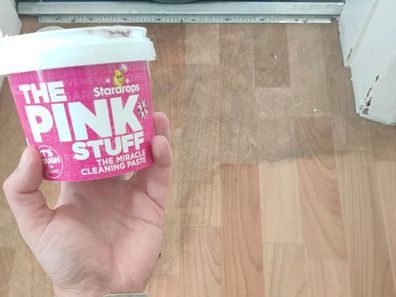 UK woman uses The Pink Stuff cleaning product on lino floors with