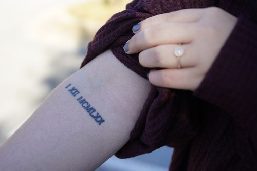 Lindsey Kirk shows a tattoo commemorating her late mother's birthday of January 12, 1970.