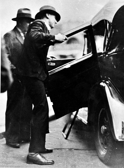 Reginald Holmes was found shot in his car.