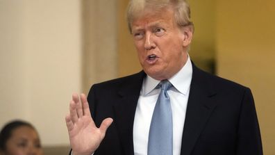 Former President Donald Trump leaves the courtroom during the lunch break of his civil business fraud trial at New York Supreme Court, Wednesday, Oct. 18, 2023, in New York.