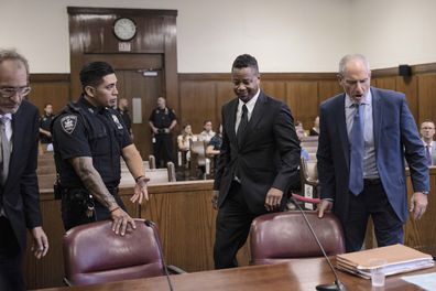 Actor Cuba Gooding Jr., center, appears in Manhattan Criminal Court for his sexual misconduct case, Thursday, Oct 13, 2022, in New York. 