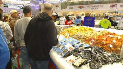 Thousands of customers head to Sydney Fish Markets on Good Friday