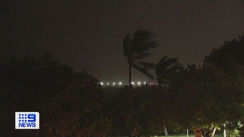 Townsville has escaped major destruction from Tropical Cyclone Kirrily as the storm shifted gears before crossing the coast.