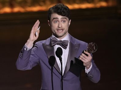 Daniel Radcliffe accepts the award for best performance by an actor in a featured role in a musical for Merrily We Roll Along during the 77th Tony Awards on Sunday, June 16, 2024, in New York.