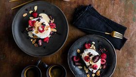 Luke Mangan's soft Swiss meringue with berries and almond anglaise