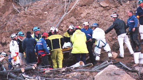 Rescuers retrieve Stuart Diver from the rubble of the Thredbo landslide.