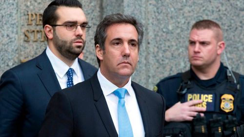 Michael Cohen leaves federal court in New York after his home and offices were raided by the FBI. (AP).