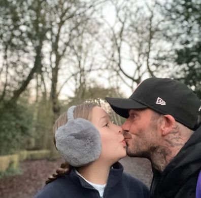 David Beckham has been criticised for posting photos of himself kissing daughter Harper.