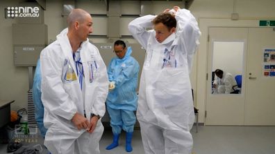 60 Minutes reporter Tom Steinfort starts to suit up, before he gets 120 seconds inside Fukushima's reactor 3