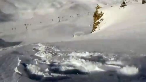 Snowboarder survives French avalanche