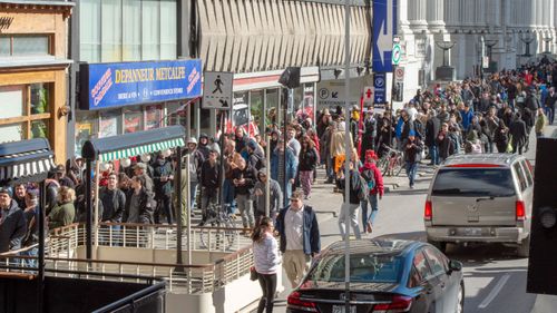 People line up for hours to buy marijuana after the substance was legalised in Canada.