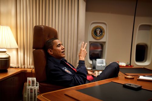 President Barack Obama kicks back on his first flight aboard Air Force One.