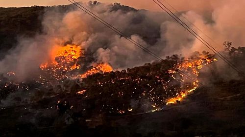 A bushfire is burning out of control north-east of Melbourne, Victoria.