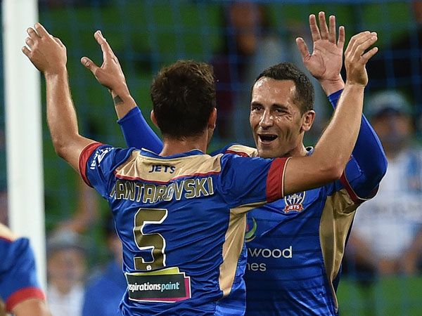 The Newcastle Jets celebrate a goal in the 3-2 win. (AAP)