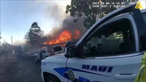 Maui police held a news conference on Monday (Tuesday AEDT) to show 16 minutes of body camera footage taken the day a wildfire tore through Lahaina town in August, including video of officers rescuing 15 people from a coffee shop and taking a severely burned man to a hospital.